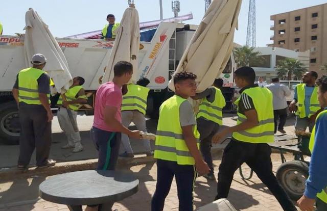 حملة لإزالة الإشغالات والإعلانات المخالفة بشوارع وميادين بيلا بكفرالشيخ