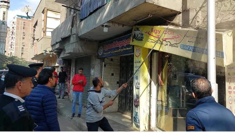 حملات إزالة اشغالات المحال والمطاعم بشارع فيصل وعدداً من شوارع العمرانية