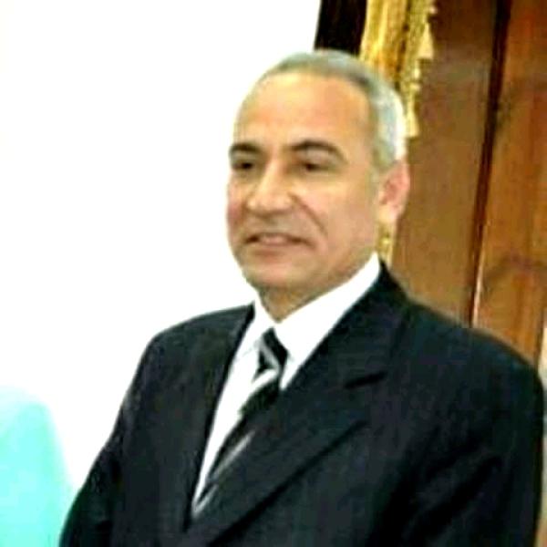  الدكتور حسن سند عميد كلية الحقوق بجامعة المنيا