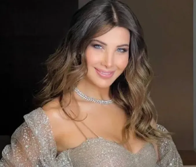 نانسي عجرم تستكمل أغانيها مع الراحل محمد رحيم