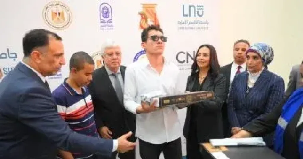 وزيرة التضامن تسلم جامعة الأقصر الأهلية طابعة برايل ولاب توب لذوى الإعاقة البصرية