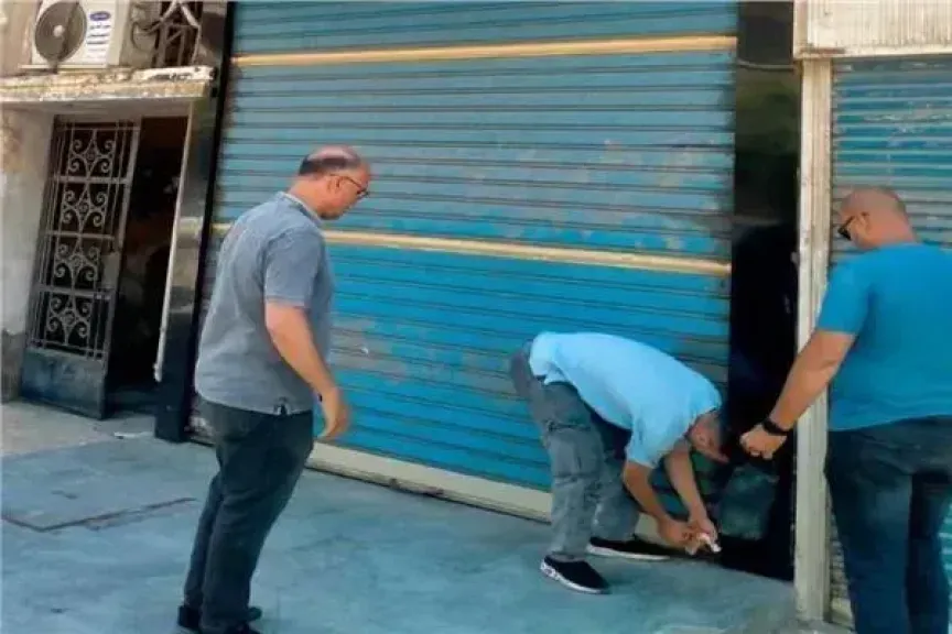 غلق وتشميع محال مخالفة بمنطقة الزمالك في حي غرب القاهرة