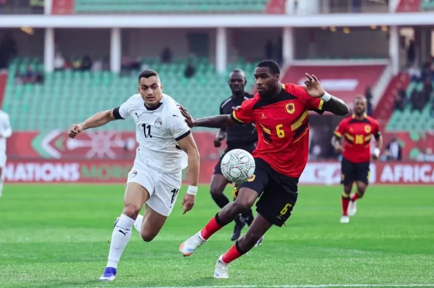 منتخب الفراعنة يتعادل أمام أنجولا ويتأهل رسميًا لدور الـ16|صور