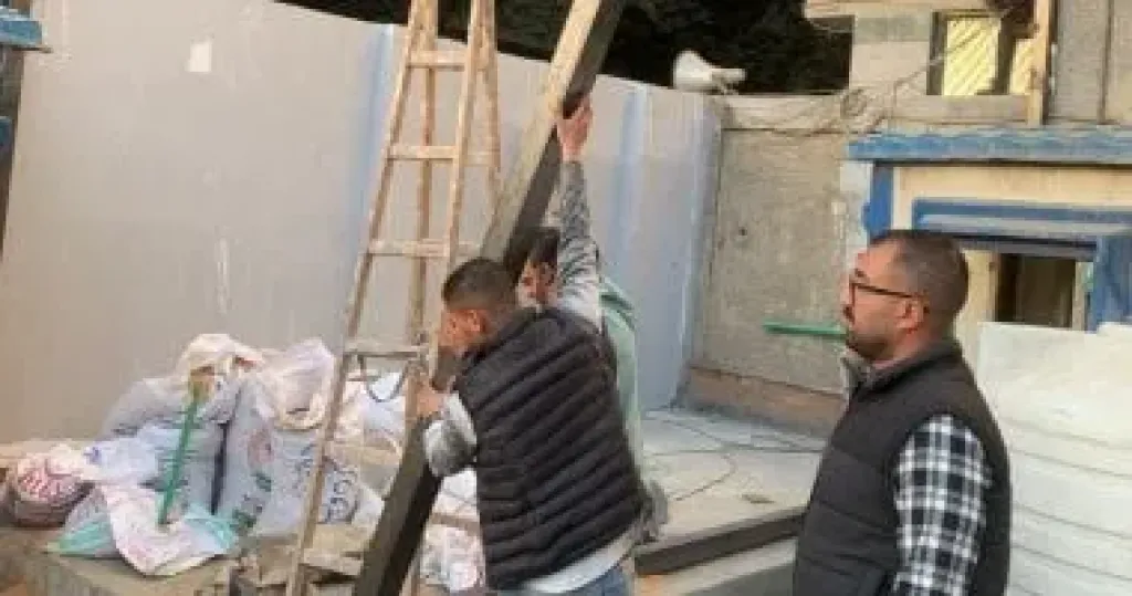 حى العجوزة يزيل جمالون حديدى مخالف بشارع أحمد عرابى