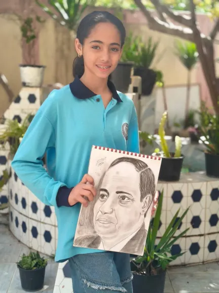 تكريم طالبة موهوبة بالبحيرة بعد إبداعها بورتريه للرئيس السيسي