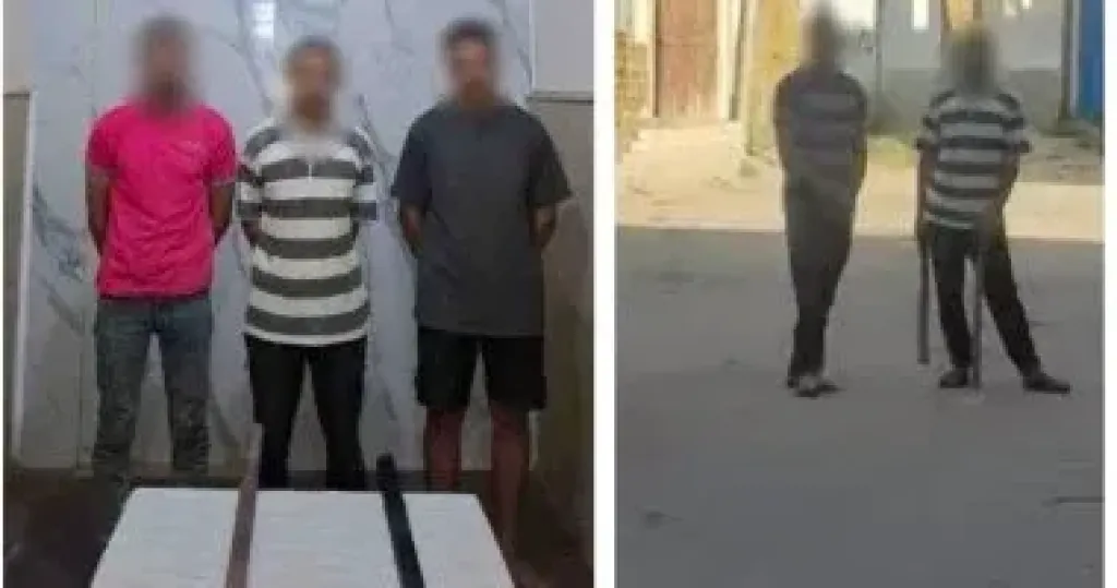 ضبط المتهمين بالتلويح بعصا خشبية على الجيران بسبب خلافات الجيرة