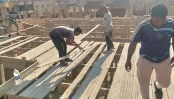 فك شدة خشبية بعقار مخالف بحدائق الأهرام واتخاذ الإجراءات القانونية