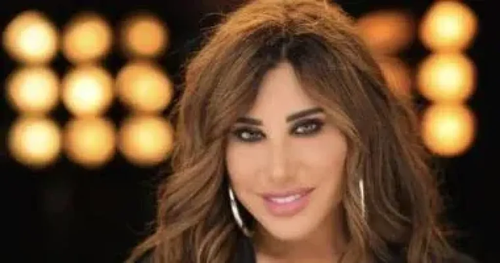 نجوى كرم تضع حدا لشائعات الطلاق بظهورها مع زوجها
